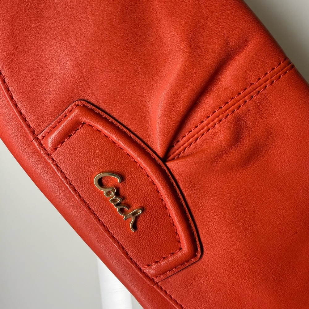 Coach Leather Wristlet Clutch in Coral
